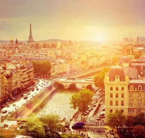 Beautiful sunset over Paris with iconic Eiffel Tower and scenic river views.