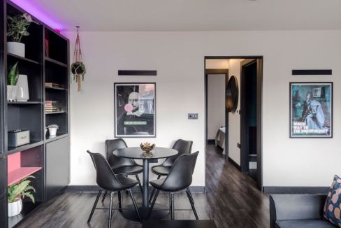 Stylish Soho Old Compton Street apartment interior with dining area and modern decor.