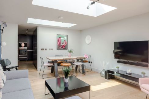 Bright, stylish interior of Covent Garden Long Acre Penthouse with natural light.