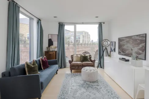 Bright living space with contemporary decor and scenic city views.
