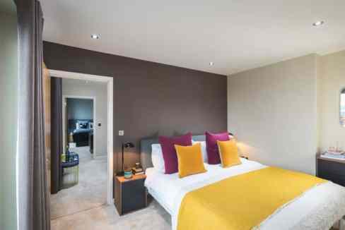 Bright and modern bedroom in Waterloo Stamford Street Apartments, London.