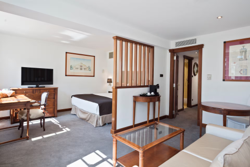 Modern studio apartment at Albany Street, featuring a cozy living area and contemporary decor.