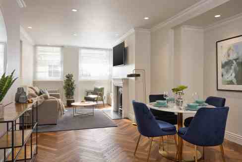 Interior view of Mayfair Gilbert Street Apartments, showcasing modern living and dining areas.
