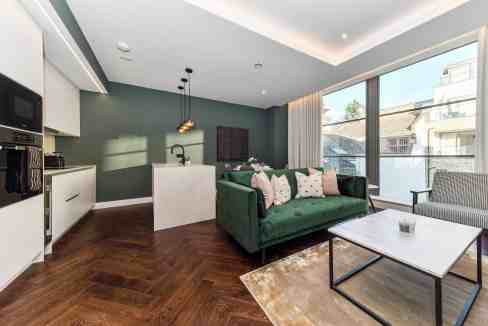 Bright and spacious living area in North Kensington serviced apartments with contemporary decor.