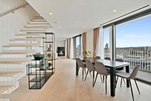 Bright, airy space with large windows and city views.