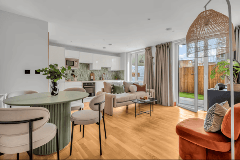Spacious living room in Limehouse serviced apartments with natural light and contemporary decor.