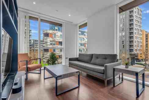 Modern living room with city views at Canary Wharf Maine Tower.