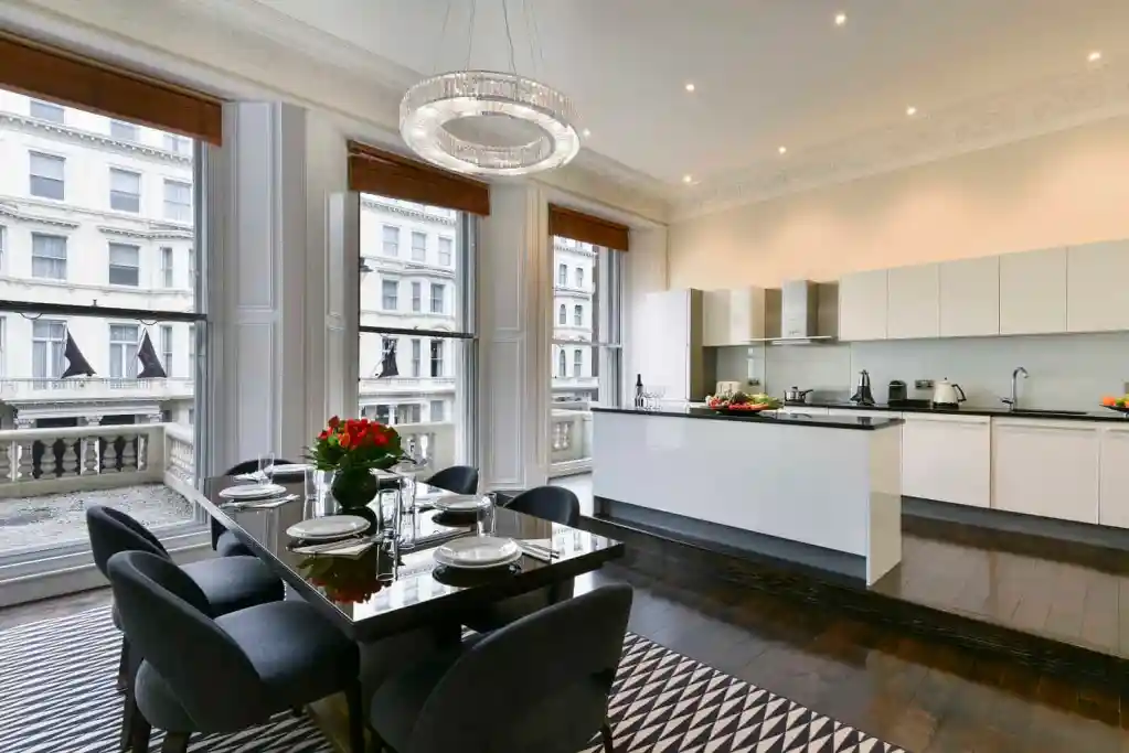 Luxury South Kensington apartment with modern kitchen and dining area.