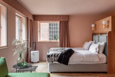 Interior view of a stylish Manchester Princess Street Aparthotel room with natural light.