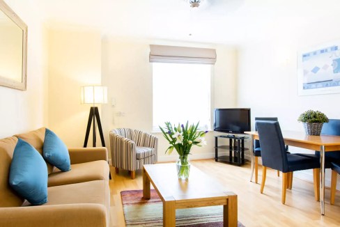 Bright and spacious Jersey St Helier apartment living room with contemporary furniture.