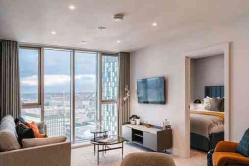 Luxury apartment interior with panoramic cityscape views from Liverpool Princes Dock.