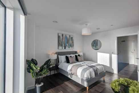 Modern Southampton Centenary Plaza Apartments bedroom with stylish decor and natural light.