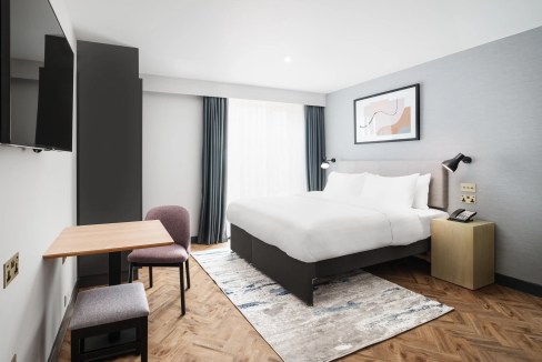 Brighton Fleet Street Aparthotel modern hotel room with a comfortable bed and stylish decor.