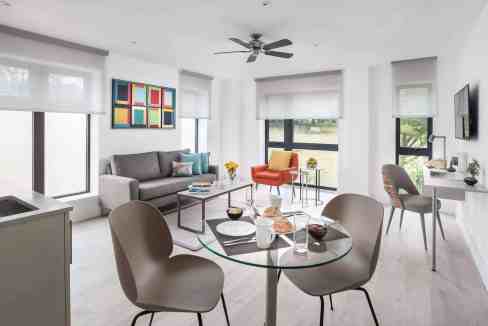 Bright, airy living room at Edinburgh Playhouse Theatre Aparthotel with contemporary decor and large.