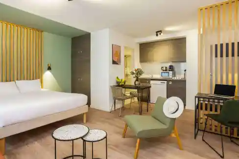 Bright, contemporary apartment at Montpellier Comedie Aparthotel with modern furnishings.