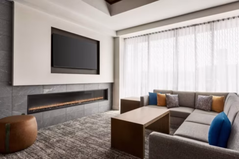 Modern extended-stay suite at Downtown Houston Aparthotel with full kitchen and workspace