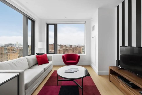 Bright Brooklyn apartment interior with spacious living area and contemporary decor.