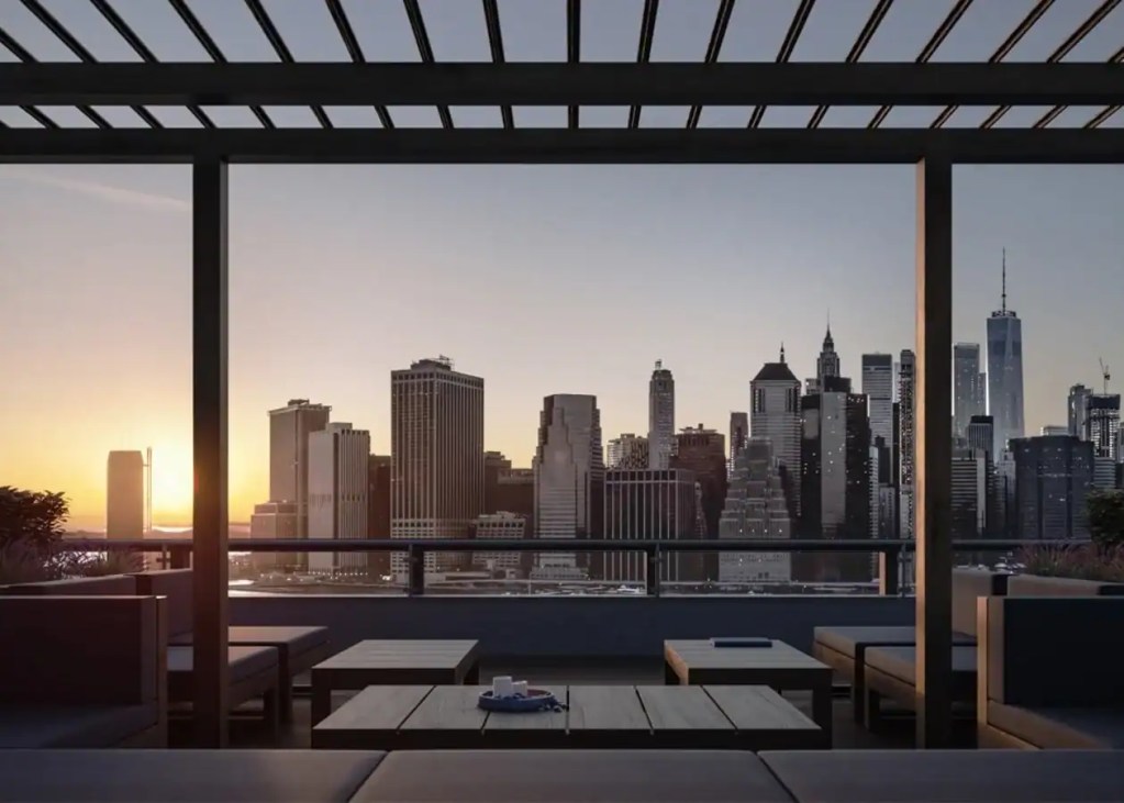 Brooklyn Heights skyline view from a balcony at sunset, showcasing NYC skyscrapers and iconic buildi.