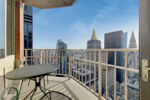 Balcony view of Manhattan skyscrapers from Madison Avenue Apartments.