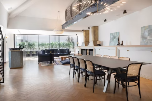 Elegant dining area with floor-to-ceiling windows