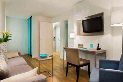 Modern Toulouse Jean-Jaurès Aparthotel living room with contemporary decor and amenities.