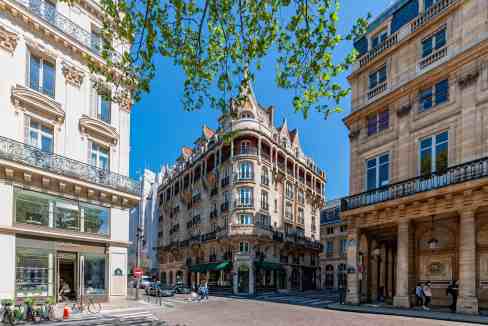 Historic Parisian building near Louvre Museum with classic architecture.