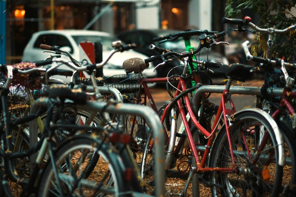 Bicycles parked on a city street in Berlin, Germany.