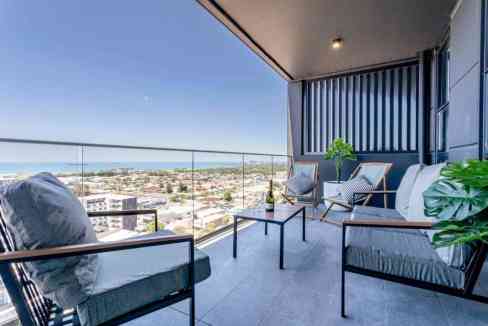 Balcony of Wollongong Atchison Apartments offering stunning ocean views and contemporary outdoor fur.