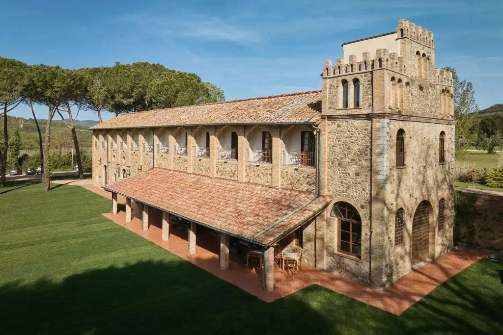 Historic countryside estate at Agriturismo Villetta Di Monterufoli, surrounded by lush greenery and.