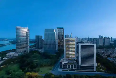 Aparthotel near Xuanwu Lake in Nanjing with modern high-rise buildings and scenic views.