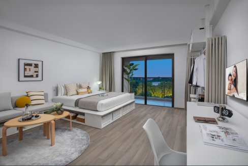 Modern apartment room at Shanghai Jiading Aparthotel with large window overlooking the cityscape.