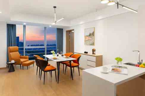 Bright and spacious living and dining area with large windows overlooking Suzhou skyline.