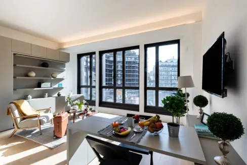 Interior view of a stylish Milan Central Tower apartment living room.
