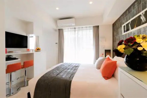 Modern Tokyo Minami Azabu Aparthotel room with stylish decor and natural light.