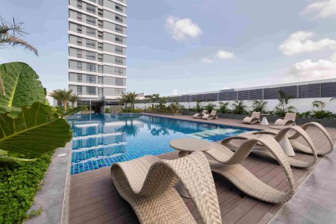 Poolside relaxation at Bacolod Bata Aparthotel in Bacolod City.