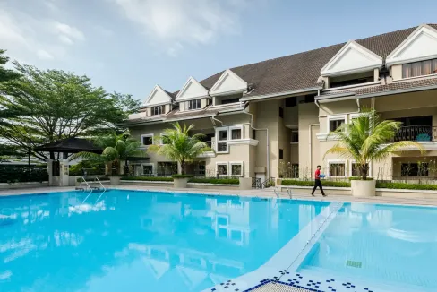 Modern apartment complex with outdoor swimming pool in Kuala Lumpur Bangsar area.