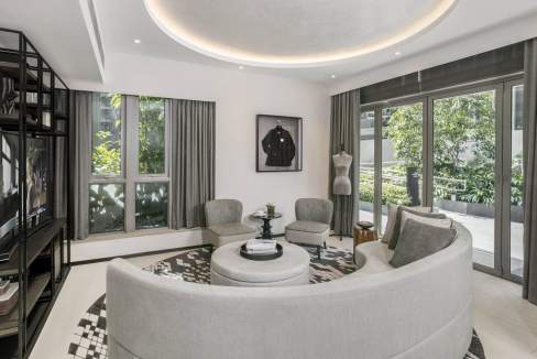 Spacious Singapore Orchard Road Aparthotel living area with contemporary decor.