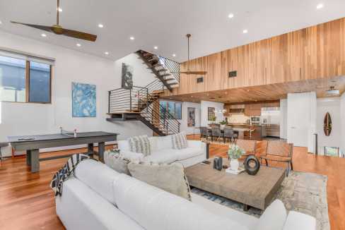 Spacious living room with coastal decor in Oakwood Coastal Hideaway.