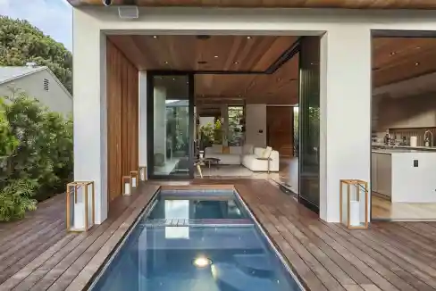 Modern Venice Horizon Residence with pool and wooden deck.