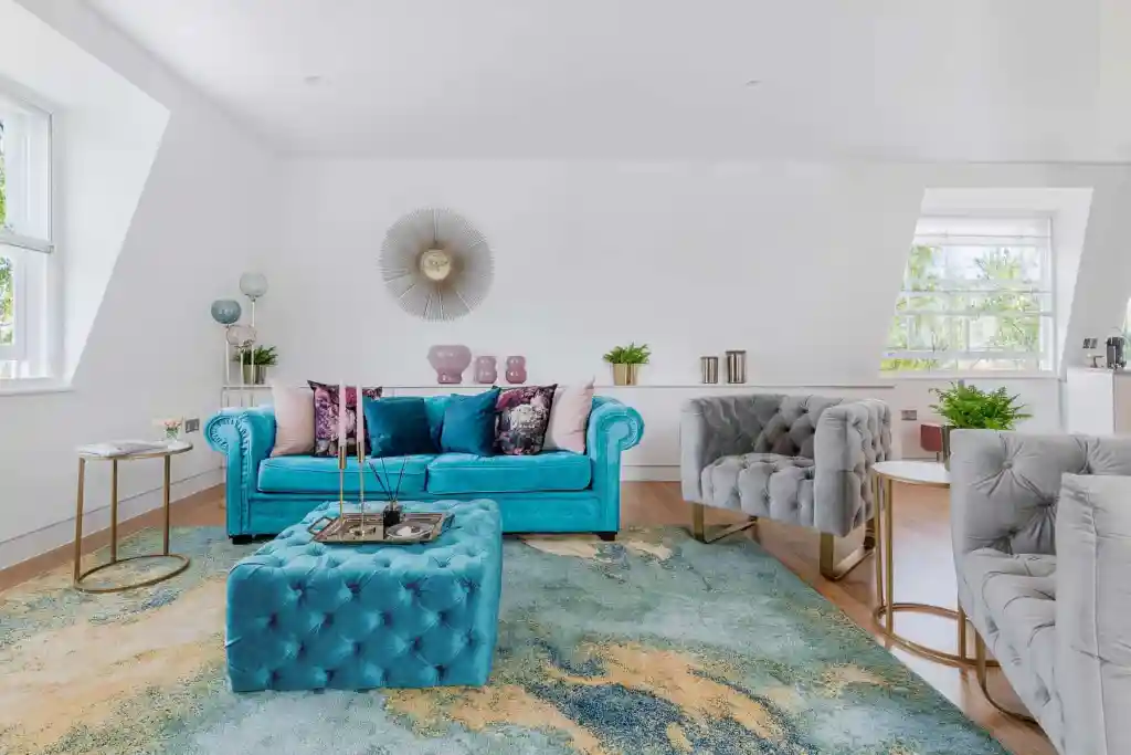 Bright and stylish living room with colorful furniture and decor.