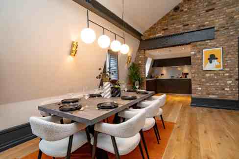 Stylish dining area with modern decor and warm lighting in Covent Garden.