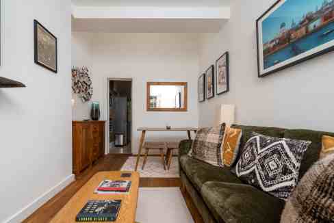 Cozy living room with vintage decor and modern furnishings at Farringdon Vintage Villa.