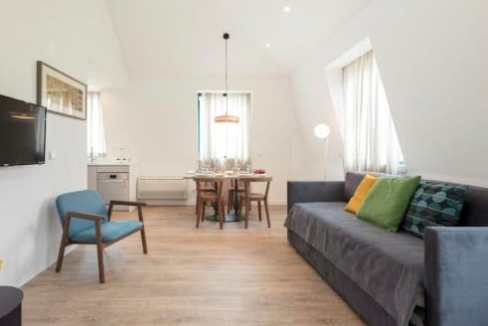 Modern living room in Chiado Lisbon Collection serviced apartment.