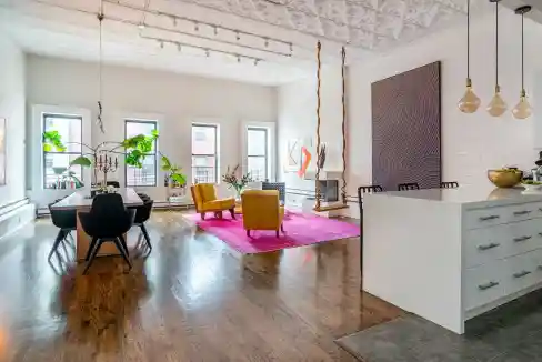 Spacious modern loft with stylish furniture and bright natural light.