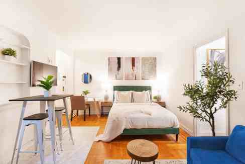 Bright, modern studio apartment with stylish decor and natural light.