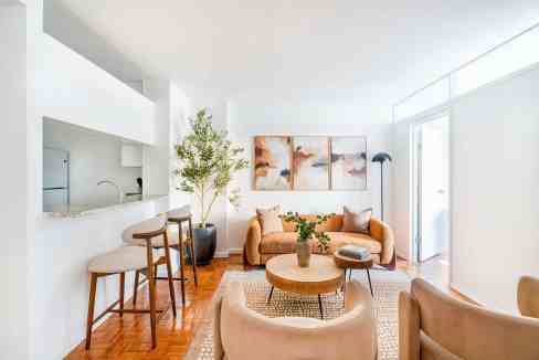 Bright and stylish living room in a serviced apartment with modern decor.