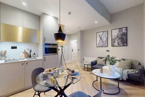 Stylish living room with sofa, coffee table, and modern decor in Chelsea Modern Nook.