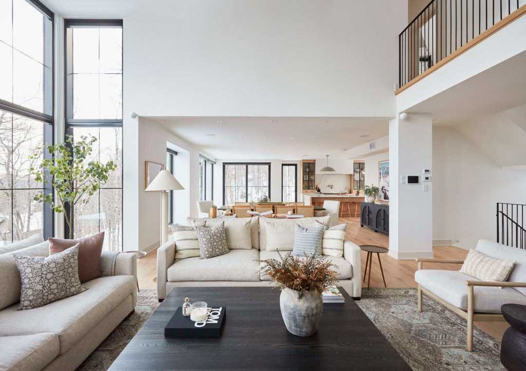 Bright and airy living room with large windows and contemporary furniture.