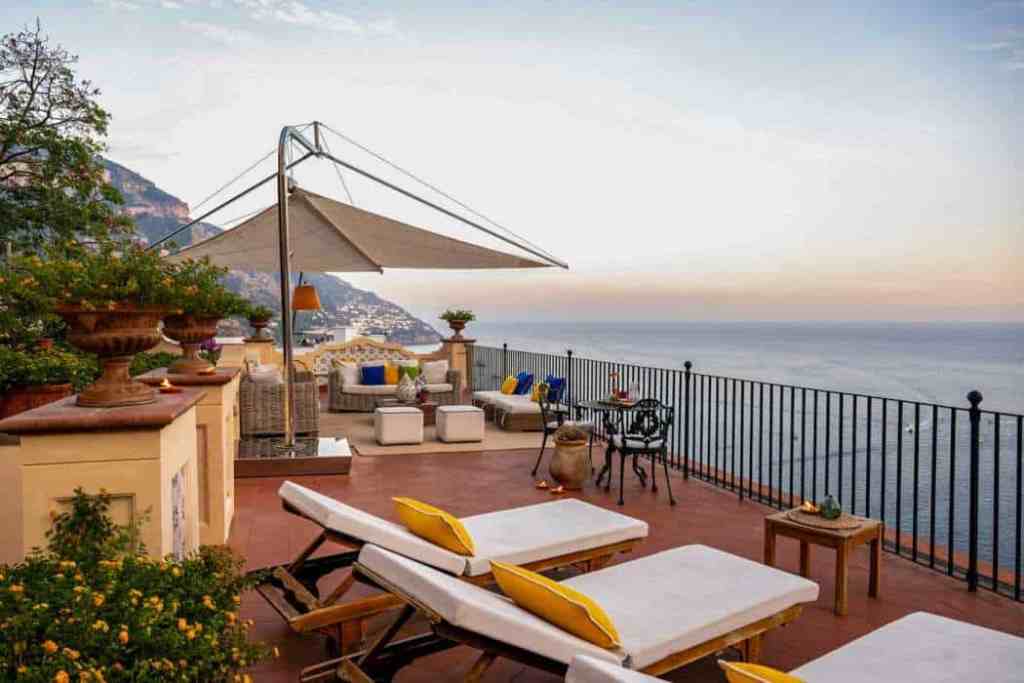 Scenic terrace with sun loungers and sea view at Positano Lemon Villa.