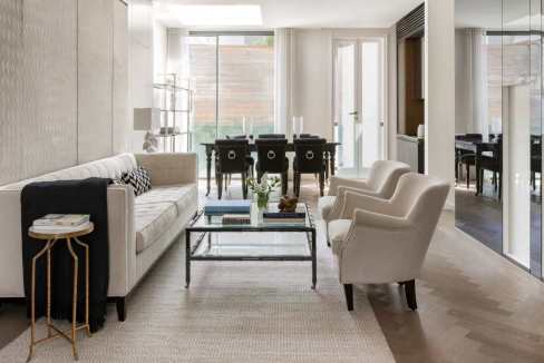 Stylish living room with contemporary furniture and natural light in Knightsbridge.